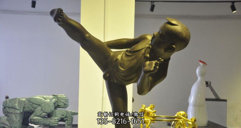 公园练功夫的小男孩人物铜雕 公园练功夫的小男孩人物铜雕