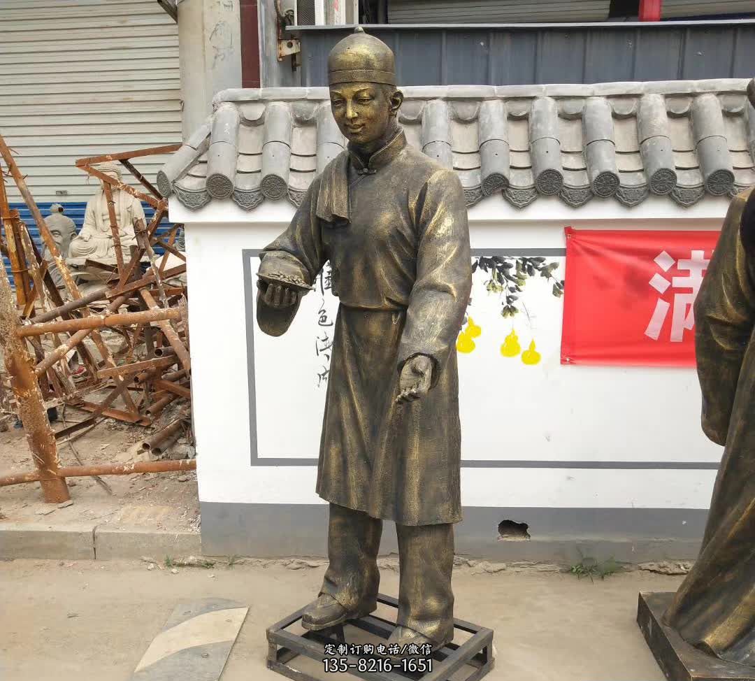 步行街店小二人物铜雕 步行街店小二人物铜雕