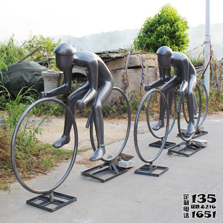 体育广场摆放玻璃钢仿铜自行车人物雕塑