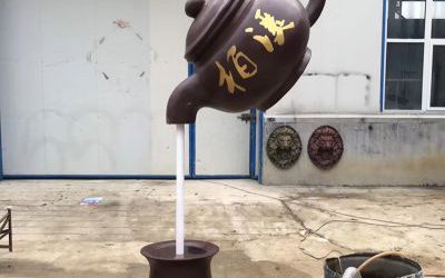 户外玻璃钢仿铜悬浮流水天壶雕塑