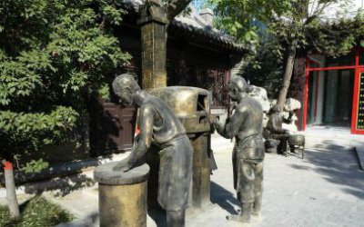 玻璃钢仿铜城市街道民俗小品小贩人物雕塑
