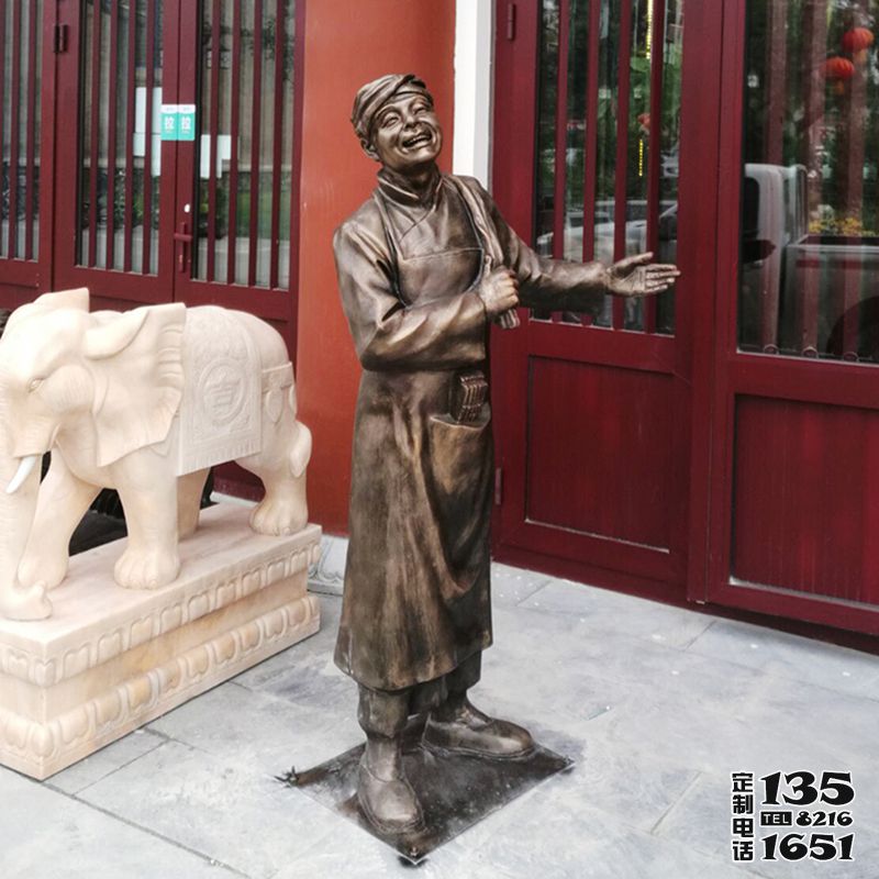 饭店门口仿铜小二迎宾玻璃钢雕塑 饭店门口仿铜小二迎宾玻璃钢雕塑
