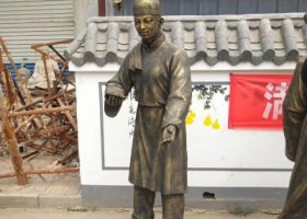 步行街摆放站姿店小二玻璃钢仿铜雕塑